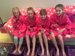 Girls enjoying their foot soaks at their pamper party